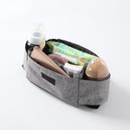 Heyoravix stroller organizer bag compartments holding bottles and baby essentials