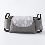 Heyoravix stroller organizer bag attached to stroller in use