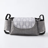 Heyoravix stroller organizer bag attached to stroller in use