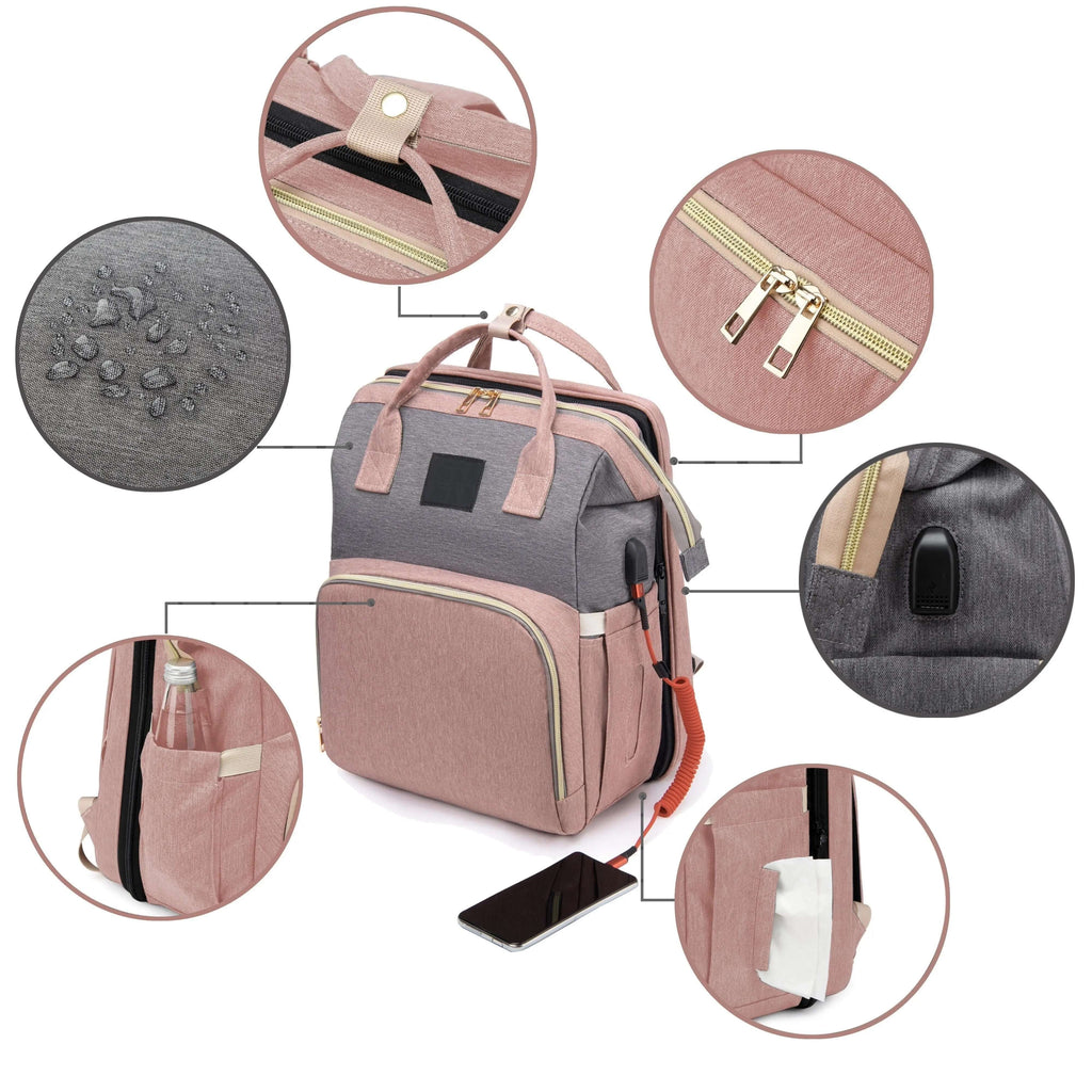 Baby changing backpack with portable crib showing waterproof fabric, USB port and storage pockets